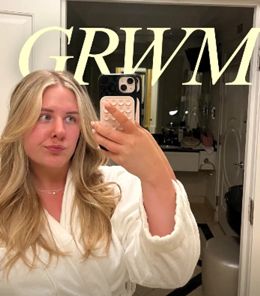 Socially Hygge founder mirror selfie in white robe with GRWM editorial text, sharpened for the homepage hero