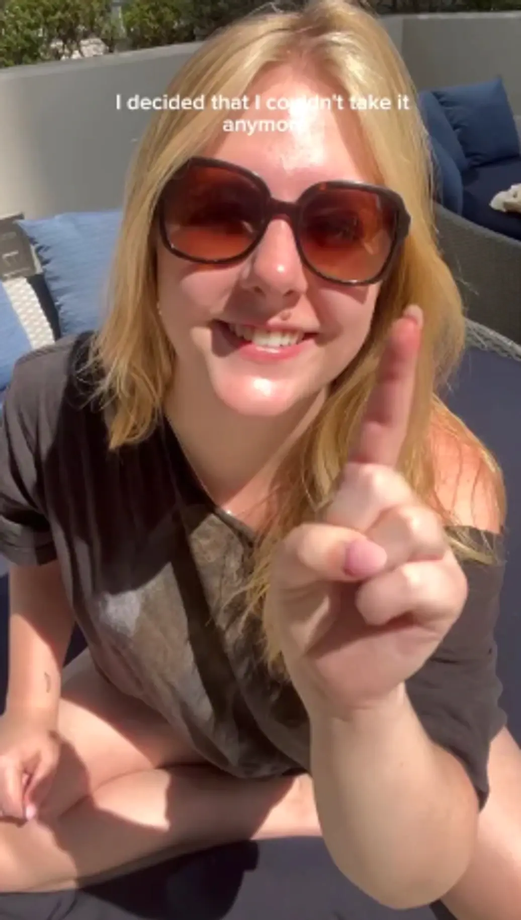 Socially Hygge founder in sunglasses on a patio pointing at the camera, sharpened for the lifestyle vibe collage